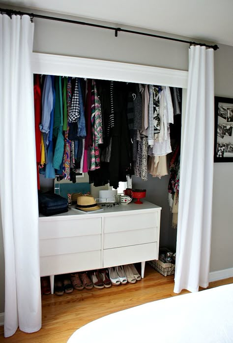 If you hang your closet's rod above eye level, you can slip in a sturdy (and stylish) dresser underneath. Curtains For Closet Doors, Ideas Armario, Organiser Son Dressing, Smart Closet, Dresser In Closet, Closet Curtains, Organized Closet, Open Closet, Small Closets