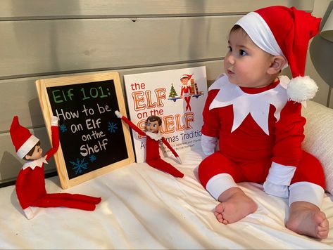 Real Baby Elf On The Shelf Ideas, Elf On The Shelf Photoshoot Baby, Elf On The Shelf Baby Photoshoot, Baby Elf On The Shelf Pictures, Baby Elf On The Shelf, Elf Photoshoot, Ugly Christmas Sweater Diy Funny, Baby Shelves, Six Month Baby