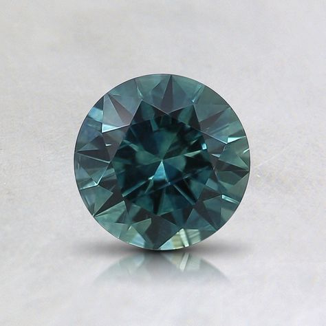 5.5mm Premium Teal Round Montana Sapphire | STMT5.5RD2 Classic Diamond Engagement Ring, Brilliant Earth Rings, Peacock Ring, Teal Cushions, Gemstone Engagement Ring, Unique Engagement Ring Settings, Earth Design, Round Sapphire, Montana Sapphire