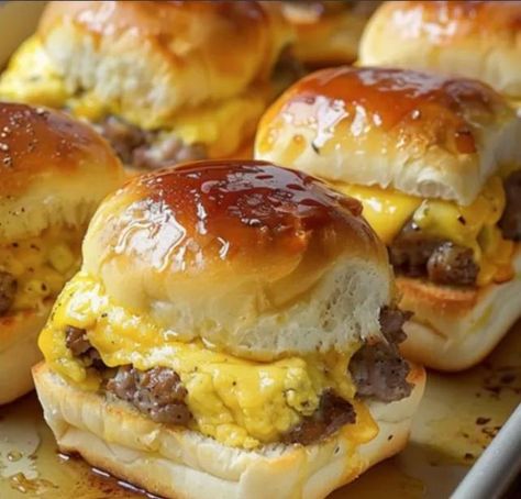 Sausage Egg and Cheese Breakfast Sliders     Ingredients     24 ounces ground pork sausage, 2 breakfast sausage rolls, like Jimmy Dean 12 Hawaiian buns, or other slider buns 8 large eggs, scrambled 6 slices pepper jack cheese 8 slices American cheese 1/2 cup butter, melted 1/4 cup maple syrup     Instructions     Preheat oven to 350°F. Warm large skillet over medium heat. Form sausage into 12 patties, slightly larger than one dinner roll. Add sausage to skillet and cook until completely ... Sausage Egg And Cheese Breakfast Sliders, Jimmy Dean Maple Sausage Recipes, Hawaiian Roll Sliders Breakfast, Breakfast Sliders Recipes, Recipes With Maple Sausage, Jimmy Dean Sausage Recipes, Chuck Steak Recipes, Sausage Sliders, Ground Sausage Recipes