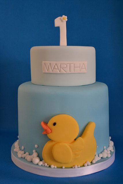 Yellow duck 1st birthday cake by madebymariegreen, via Flickr Rubber Ducky Cake Ideas, Duck Themed 1st Birthday Cake, Yellow Duck Birthday Cake, Rubber Ducky Birthday Cake, Rubber Duck Cake Birthday, Duck Cakes Birthday, Birthday Cake Duck, Duck Birthday Decorations, Duck Theme Cake