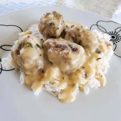 Swedish Meatballs with Cream of Mushroom Soup Recipe | Allrecipes Swedish Meatballs With Cream Of Mushroom Soup, Meatballs With Cream Of Mushroom Soup, Swedish Meat, Easy Swedish Meatball Recipe, Slow Cooker Swedish Meatballs, Swedish Meatballs Recipe, Delicious Meatballs, Mushroom Meatballs, Swedish Meatballs Easy