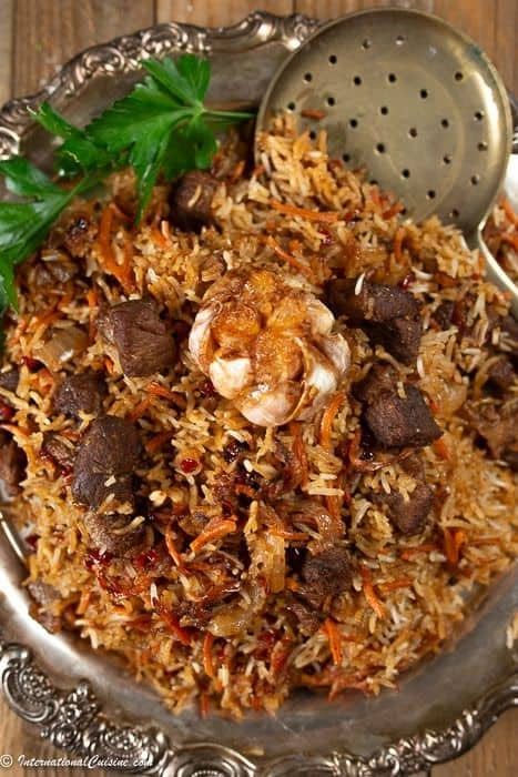 Plov is considered to be the National dish of Uzbekistan and Tajikistan where it called osh. A scrumptious main course for any occasion. Tajik Food, Azerbaijani Food, Uzbekistan Food, Dishes Around The World, Nepal Food, Eastern European Food, Iranian Food, Bread Salad, European Cuisine