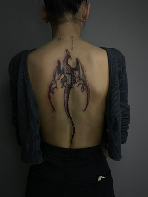 Dragon Tattoo ideas #enchantedtattoo #tattooideas #tattoodesigns #forearmtatsforwomen #tattoos #realism #artbody #coupl #latinatattooideas #baddietatsarmsleeve #tattoo #tattoos #tattooart #bodyart #tattooinspiration #tattoostyle #tattooideas #tattoolove #tattooaddict #inked Dragon Tattoo Ideas, American Traditional Tattoo Ideas, Bookish Tattoos, Sagittarius Tattoo, Dragon Tattoo For Women, Traditional Tattoo Ideas, Wicked Tattoos, Spine Tattoos For Women, Back Tattoo Women