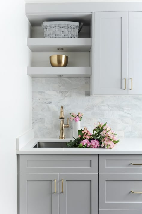 Kitchen With Gray Cabinets, White Marble Backsplash, Gray Shaker Cabinets, Cabinets Shelves, Grey Kitchen Designs, Laundry Room Sink, Transitional Home, Laundry Design, Gray Cabinets