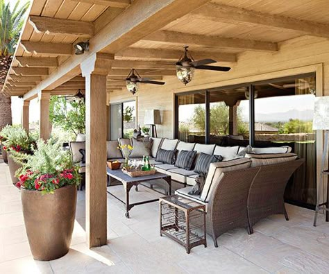 Covered Patios--Roofline Details The execution of a covered patio’s roof can do much to enhance its level of intimacy. Here, regular placement of beams -- their ends gently carved -- offer a soothing visual ceiling to the rustic-leaning spot. If your covered patio is on the same plane as another paved space or the landscape, use oversize planters -- here, hammered copper -- to create a transition from one zone to the next. Shed Inspiration, Outdoor Covered Patio, Covered Patios, Patio Pergola, Casa Country, Pergola Design, Patio Covers, Patio Cover, Budget Patio