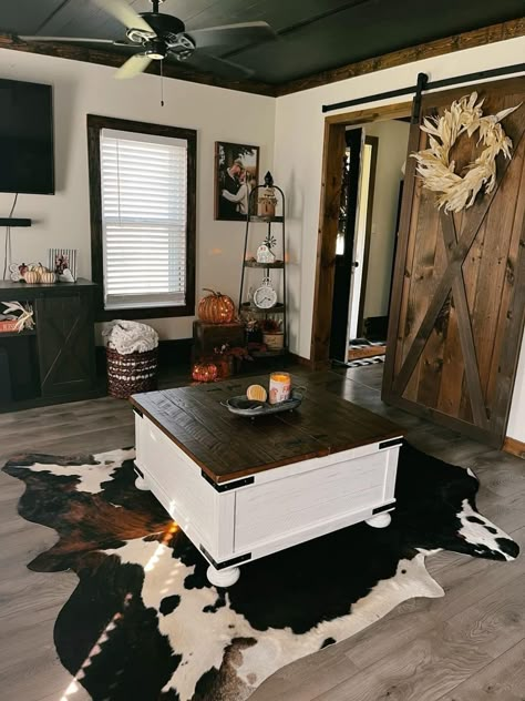 Cow Hide Living Room Decor, Western Home Remodel Ideas, Western Tiny House Ideas, Western Interior Design Living Room, Dark Western Living Room, Western Trailer House Ideas, Rust And Black Living Room, Western Mobile Home, Western Home Decor Ranch Style Living Room