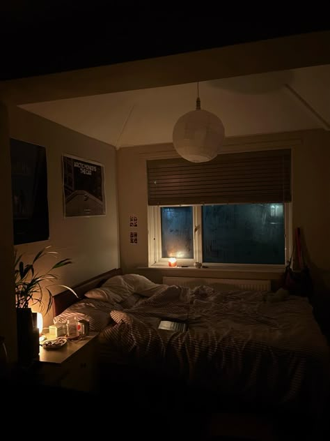 bedroom inspo . room inspo . room lighting inspo . warm room lighting . poster bedroom aesthetic . striped bed sheet . autumn aesthetic . bedside table inspo . autumn room inspo Dim Lit Bedroom, Dim Lit Room, Mood Light Bedroom, Clean Dark Room Aesthetic, Dimly Lit Bedroom, Dim Lighting Aesthetic, Dimly Lit Room Aesthetic, Dim Room Aesthetic, Ambient Bedroom Lighting