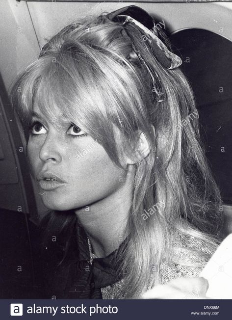 Download this stock image: Aug. 28, 1963 - BRIGITTE BARDOT flew into London From Pairs 1963.Supplied by   Photos, inc.(Credit Image: © Globe Photos/ZUMAPRESS.com) - DNX66M from Alamy's library of millions of high resolution stock photos, illustrations and vectors. Bardot Makeup, Bridget Bardot Hair, Brigitte Bardot Hair, Bardot Bangs, Bardot Hair, Bardot Brigitte, Bridgette Bardot, Bridget Bardot, Bardot Style