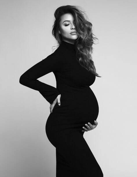 We're In Love With These 10 Maternity Photoshoot Ideas Maternity Studio Photoshoot, Studio Maternity Photos, Maternity Photography Poses Couple, Maternity Photo Shoot Ideas, Maternity Photography Studio, Pregnancy Photo Shoot, Couple Pregnancy Photoshoot, Maternity Photoshoot Outfits, Maternity Photography Poses Pregnancy Pics