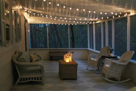 Simple screened porch light - outdoor string lights make everything look pretty and are easy to install. Porch String Lights, Porch Lighting Ideas, Screen Porch Ideas, Screened Porch Ideas, Screened Porch Decorating, Porch Kits, Screened Porch Designs, Christmas Lights Outside, White Christmas Lights