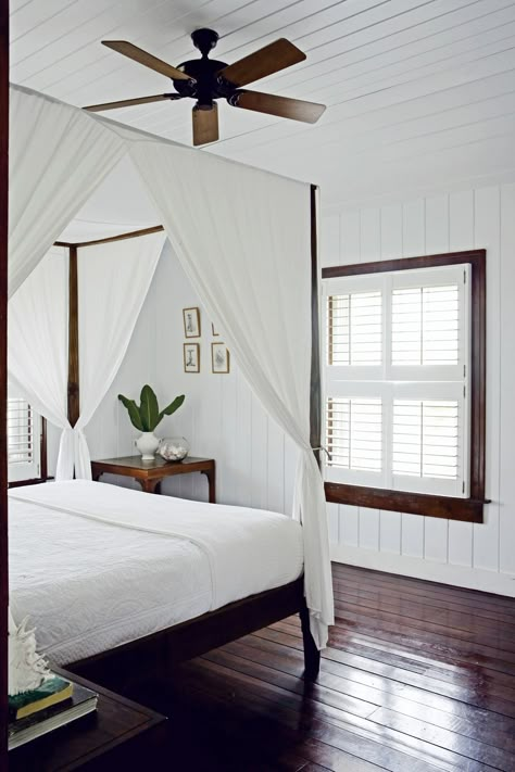 A new book reveals how the design and architecture of seaside homes are influenced by their setting | archdigest.com British West Indies Style Bedroom, Tropical British Colonial Interiors, Caribbean Bedroom, Modern British Colonial, Colonial Style Bedroom, British Colonial Bedroom, Tropical British Colonial, Colonial Bedroom, British Colonial Decor