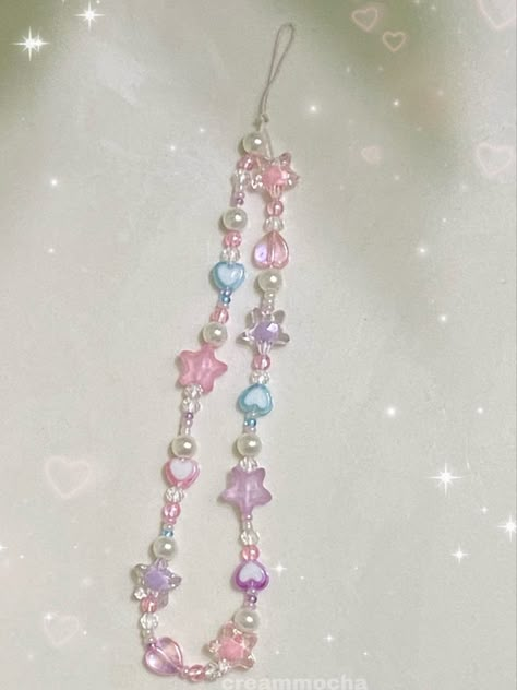 pink, purple, blue cute phone charm Phone Charms Pastel, Trendy Phone Charms, Phone Chain Aesthetic, Aesthetic Phone Chain, Charms Phone Case, Pastel Phone Charm, Phone Carm Aesthetic, Phone Chain Beads Aesthetic, Phone Charms Aesthetic Purple