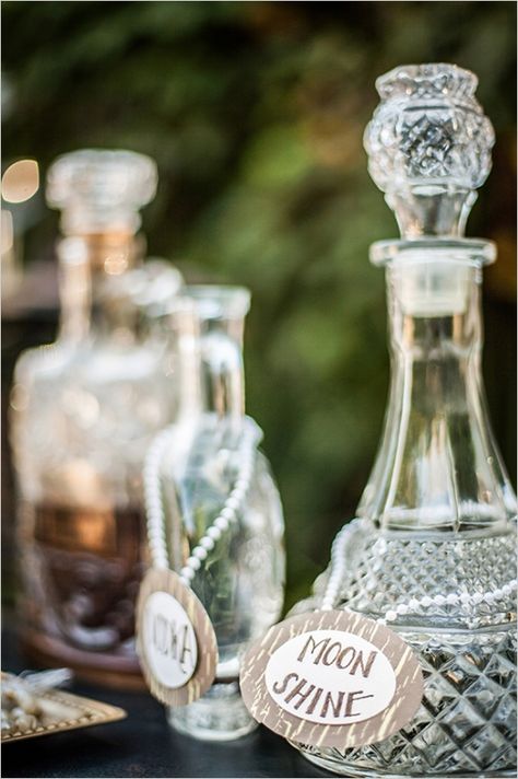 label vintage bottles #roaring20wedding #cocktailstation #weddingchicks http://www.weddingchicks.com/2014/01/02/easy-roaring-20s-wedding-ideas/ Vintage Bottles Wedding, Art Deco Wedding Inspiration, Roaring 20s Wedding, 20s Wedding, Roaring 20s Party, Gatsby Theme, Great Gatsby Wedding, 1920s Wedding, Wedding Bottles