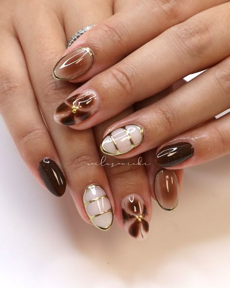 If brown isn’t a fall staple then idk what is 🍂🤎 . . #nails #nailusa #nailart #naildesign #nailsofinstagram #naildesigns #nailsoftheday #naildesignsideas #gel #gelnails #raleigh #durham #nailinspo #raleighnailtech #ncnails #raleighnails #raleighnailtech #trend #trendynails #BIAB #springnails #BIABnails #summernails #naturalnails #raleighgelx #gelx #gelxnails #fallnails Holiday Nails Brown Skin, Brown Green Nails Design, Cafe Nails Design, Mocha Brown Nails Design, Brown Nails Blooming Gel, Funky Brown Nails, Single Color Nail Designs, Fall Nails Browns, Brown 3d Nails