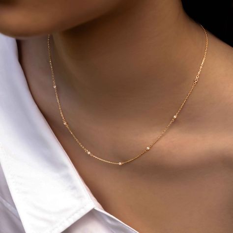 A minimal chain with maximum styling impact. Perfect for both casual and formal occasions, offering a timeless and sophisticated look. Made in 18k solid gold Adjustable chain length from 16.5 to 17.7 inches / 42 to 45 cm Free Expedited Shipping to US & Canada Orders will be wrapped in a complimentary Tillé signature gift box, with a personalized message (optional) printed a...#the #Simplicity #Minimalist #and #Organizers #Jewelry #Gemstone #of #Elegance #Exploring #Beauty #Embracing #The #Art 18k Solid Gold Jewelry, Gold Minimal Earrings, Timeless Gold Necklace, Timeless Gold Jewelry, Timeless Jewelry Pieces, Small Chains Gold, Minimal Gold Chain, Neckless Gold, Gold Chain Designs For Women