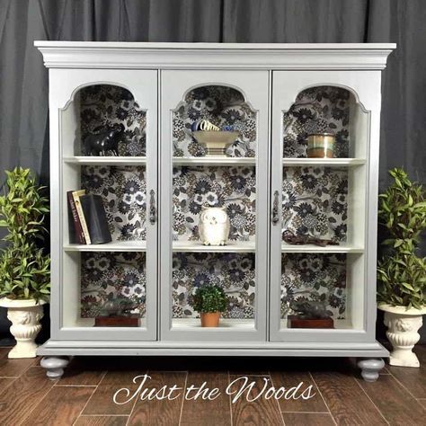 Repurpose the top of a china cabinet by adding feet and turn it into a modern chic curio cabinet. With a fabric decoupage back this painted furniture makeover is a DIY project for everyone Hutch Top Repurposed, White China Cabinet, Curio Cabinet Makeover, China Cabinet Makeover, Hutch Top, Hutch Makeover, Smart Tiles, China Hutch, Modern Bookshelf