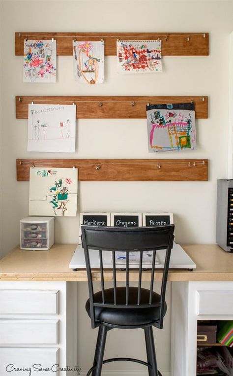 In order to make homework time a little easier, you may want to consider adding a kid-friendly workstation to your home! With space to display their artwork and work on any school projects, giving your kids a space that’s all their own can be a great way to redesign a corner of the playroom. Kids Homework Area, Harry Styles Imagine, Kids Homework Station, Diy Kids Art, Displaying Kids Artwork, Homework Station, Art Display Kids, Study Areas, Kids Artwork