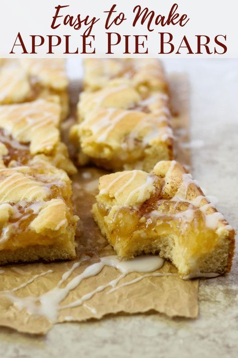 Easy Apple Pie Bars have all the flavors of a traditional apple pie with out all the work! Sweet vanilla cake is topped with store-bought apple pie filling, then topped with the remaining vanilla batter. Right before serving drizzle with a little Powder Sugar Glaze for a show stopping dessert. Don't forget the vanilla ice cream. #applepie #bars #easydessert #holidayrecipe Powder Sugar Glaze, Easy Apple Pie Bars, Apple Pie Filling Desserts, Apple Pie Bars Easy, Pie Filling Desserts, Apple Pie Bars Recipe, Traditional Apple Pie, Apple Pie Filling Recipes, Canned Apple Pie Filling