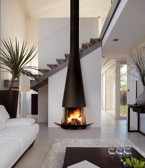 The FilioFocus free-standing fireplace is simple elegance in a fabulous Japanese minimalist style. Designed by Atelier Dominique Imbert, the slim tower of dark steel grows from the floor and... Focus Fireplaces, Design Camino, Design Interior Modern, Standing Fireplace, Fireplace Mantel Designs, Mantel Design, Freestanding Fireplace, Contemporary Fireplace, Renovation Design