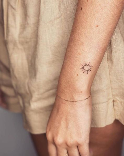 Fine line sun tattoo done on the wrist. Tiny Sun Tattoo, Simple Sun Tattoo, Tattoo Sonne, Tattoo Sun, Sunshine Tattoo, Sun Tattoo Designs, Fine Line Tattoo, Sun Tattoos, Line Tattoo