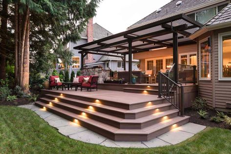 24 Jaw-Dropping Backyard Deck Ideas That Will Inspire You Tiered Back Deck, Raised Patio Deck, Walk Out Deck Ideas Backyards, Deck With Wrap Around Steps, Freestanding Deck Ideas, Upper Deck Ideas Second Story, Wide Deck Stairs, Deck Stairs To Patio, Deck With Patio Underneath