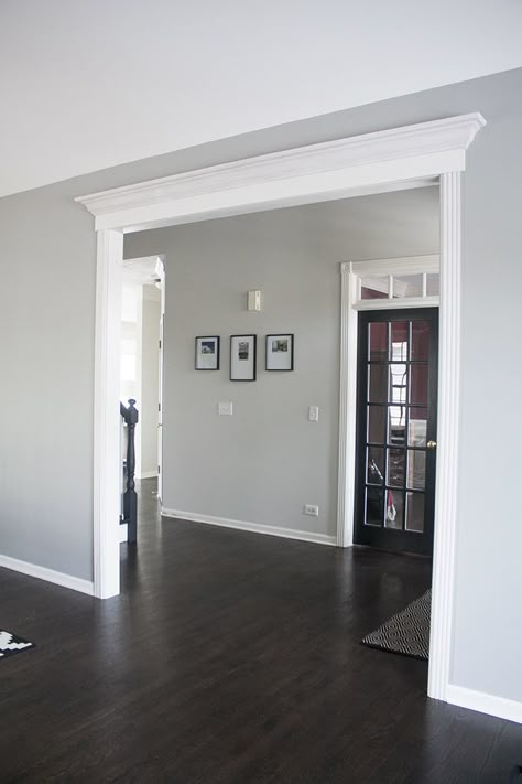 Benjamin Moore Gray Owl | you're so martha Gray Foyer Entryway Paint Colors, Shiplap Grey Wall, Gray Walls With Hardwood Floors, Grey Tint Benjamin Moore, Bm Owl Gray, Interior Paint With Dark Wood Floors, Benjamin Moore Gray Living Room, Wall Color For Living Room With Gray Furniture, Living Room Hallway Paint Wall Colors