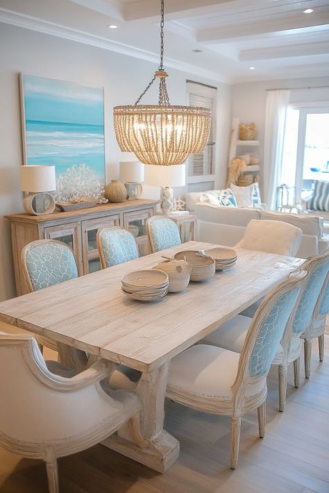 "🌊🍽️ Transform your dining space with Coastal Dining Room Decor! Think light, breezy vibes with nautical accents, driftwood, and soft blues. Perfect for a relaxing, beach-inspired meal at home. 🐚🌴 #CoastalDecor #DiningRoomDesign #BeachStyle" Blue Coastal Dining Room, Beachy Dining Table, Beachy Dining Room Ideas, Luxury Bedroom Master Modern White, Beach Glam Decor, Costal Kitchens, Coastal Breakfast Nook, Coastal Dining Room Lighting, Coastal Dining Room Table