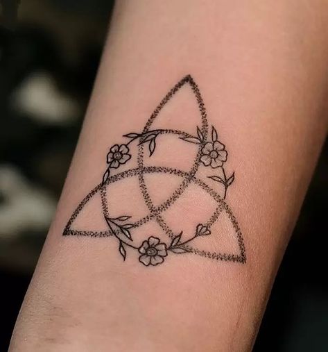 Triquetra Tattoo Meanings (With Examples) Small Tattoo Ideas Witchy, Leo Pisces Capricorn Tattoo, Trinity Tattoo Ideas, Dual Meaning Tattoo, Small Triquetra Tattoo, Simple Triquetra Tattoo, Feminine Celtic Knot Tattoo, Matching Celtic Tattoos, The Triquetra Tattoo