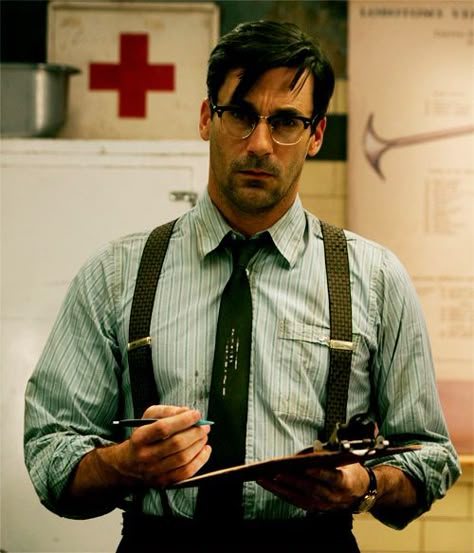 Jon Hamm. Hot Damn! He even makes suspenders look sexy..excuse me while I pick my jaw up from the floor! John Hamm, Suspenders Outfit, Don Draper, Jon Hamm, Suspenders Men, Sucker Punch, Wearing Glasses, Mad Men, Popsugar