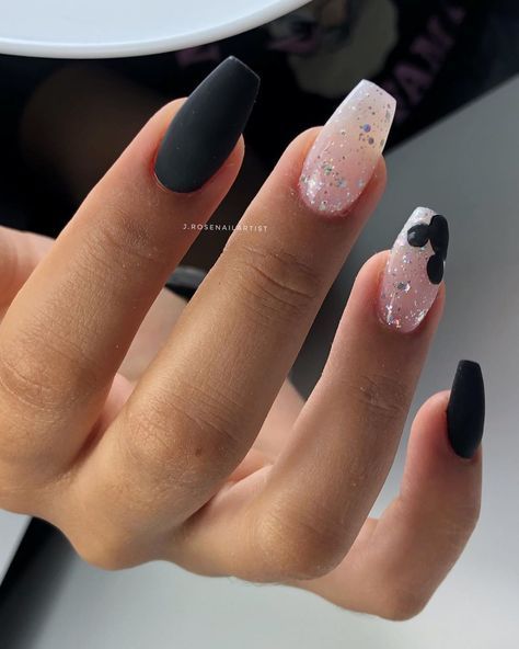 Rounded on the sides but square on the top make these coffin nails modern and chic. These come with an elegant nod to the Mouse on the party fingernail. Combined with matte black and glittery shades, these nails are perfect for formal night on a Disney cruise! #disneynails Mickey Mouse Nail Design, Disneyland Nails, Black And White Nail, Mickey Mouse Nails, Disney Inspired Nails, Disney Acrylic Nails, Mickey Nails, Disney Nails, White Nail