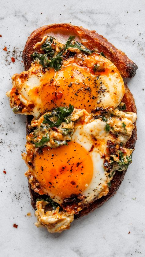 Chili crisp and kale cream fried eggs - bon abbetit Cream Fried Eggs, Chili Eggs, Fried Egg Recipe, Egg Recipes Breakfast, Kale Breakfast, Egg Dinner, Open Face Sandwich, Fried Egg Recipes, Breakfast Like A King