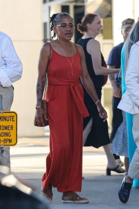 Meghan Markle Mom, Bold Tattoo, Doria Ragland, Gold Midi Dress, The Tig, Markle Prince Harry, Red Jumpsuit, Prince Harry And Meghan, Mom Daughter