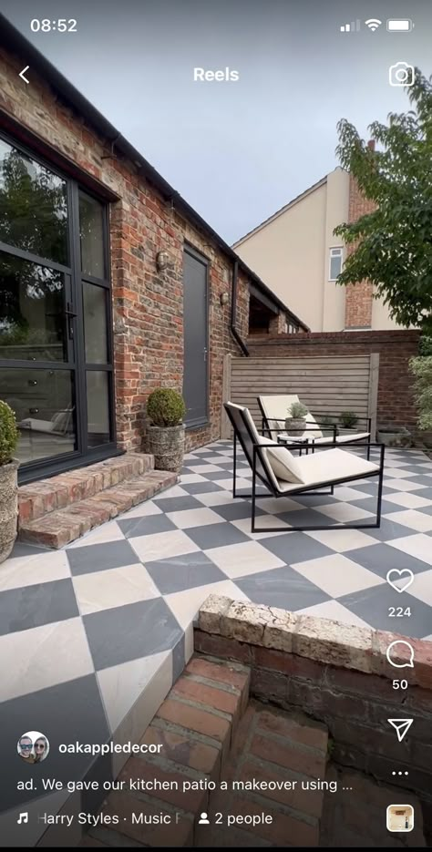 Black And White Porch Tiles, Checkered Tile Outdoor, Tudor Backyard Patio, Checkerboard Patio Floor, Diamond Patio Design, Black And White Pavers, Black And White Patio Tiles, Checkered Tile Patio, Painted Patio Slabs Outdoor Spaces