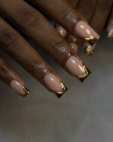 Stunning and show-stopping. A set to look and smile at always 🌟🌟 #nails #goldnails #goldchromenails #nailsinikeja #nailinspo #ogbanails #nailsaloninberger #excellencehotelogbalagos #squarenails #explore #nailsoflagos New Years Nail Designs Glitter Square, Black Tip Nails With Gold, Simple Nail Designs Gold, Black And Gold Nails Short Square, Minimal Gold Nails, New Years Square Nails, Short Square Acrylic Nails Gold, Gold Nails Acrylic Short, Short Nails New Years