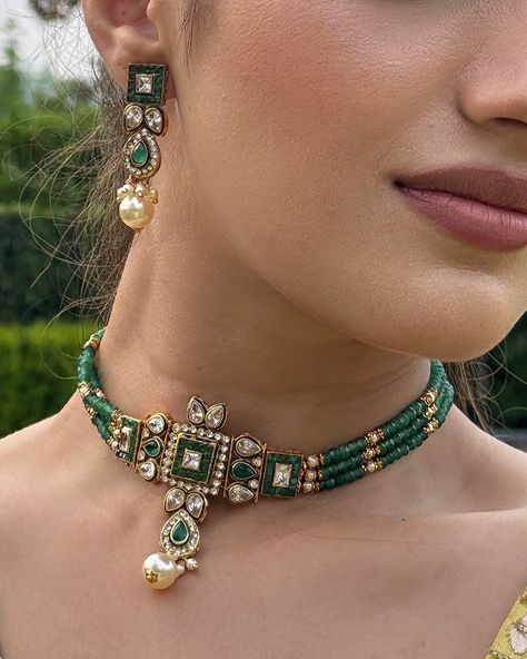 ✨ Kundan Green Majesty ✨ Elevate your style with this stunning Kundan green stone beaded choker and matching earrings set. The intricate Kundan work paired with elegant green stones and a golden touch makes it the perfect statement piece for festive occasions and weddings. 💚✨ #ShivanshriJewelry #KundanElegance #FestiveGlam #TraditionalJewelry Ganesh Puja, Kundan Choker Set, Kundan Work, Kundan Choker, Golden Earrings, Green Stones, Durga Maa, Choker Set, Traditional Jewelry