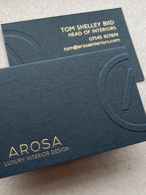 Embossed logo with gold foil printed text on a slate grey business card. Interior Design Card, Debossed Business Card, Etsy Business Cards, Architecture Business Cards, Interior Designer Business Card, Gold Foil Business Cards, Elegant Business Cards Design, Foil Embossing, Stationery Business Card