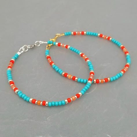 Turquoise Orange Boho Seed Bead Bracelet highlighted with silver of champagne gold beads 2mm Seed Bead Bracelet, Seed Bracelets Ideas, Seed Bead Bracelets Ideas Color Combos, Cute Seed Bead Bracelets, Seed Bead Bracelet Ideas, 2mm Bead Bracelet, Bracket Ideas, Glass Seed Bead Bracelet, Paperclip Crafts