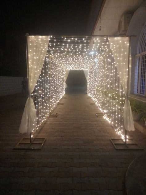 Fairy Lights Arch, Grand March Entrance Ideas Prom, Quince Entrance Ideas, Prom Decoration Ideas, Budget Friendly Wedding Ideas, Prom Centerpieces, Stage Decorations Wedding, In Home Wedding, Wedding Entrance Decoration