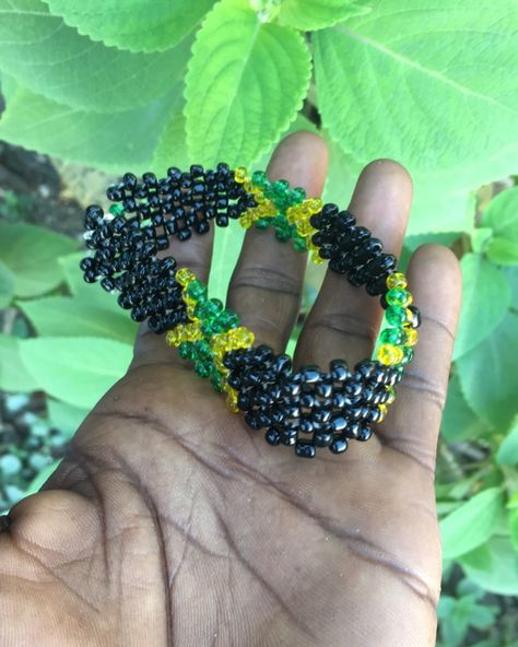 “Rep Jamaica with style! Get your unique Bracelet featuring black, gold, and green beads, symbolizing the beauty and spirit of the island. ORDERS BY: WHATSAPP Call+876-452-9986 FOR CUSTOM ORDER. Follow us on Instagram @cleantomistepentertainment_ja for more handcrafted jewelry that celebrate Jamaican culture! #Jamaican #IslandVibes #HandcraftedJewelry #SupportSmallBusiness #bracelets #braceletoftheday #artist #braceletlover #braceletshop #braceletforsale #handmadeaccessory #handmadebracel... Handmade Bra, Jamaican Culture, Island Vibes, Unique Bracelets, Green Bead, Handmade Accessories, Handcrafted Jewelry, Beads, Celebrities