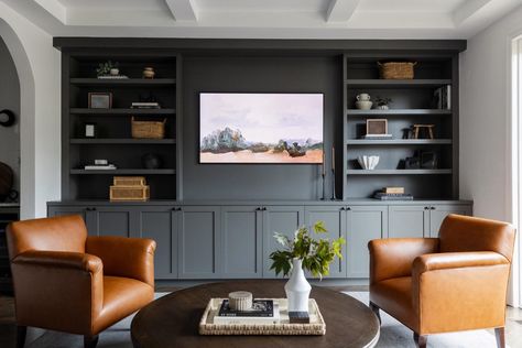 Custom built-ins create warmth and drama at #clienttraditionallymodern Designed and styled by @studiow_chicago Photography by @yandbinteriorsphotography . . . . #interiordesign #interiors #interior #livingroomdrsign #livingroom #chicago #chicagodesigner #hinsdale Dark Built In Cabinets, Dark Brown Built Ins Living Room, Dark Grey Built Ins, Charcoal Gray Built Ins, Dark Brown Built Ins, Black Built In Entertainment Center, Kendall Charcoal Built Ins, Dark Built Ins Living Room, Built In Tv Wall Unit Dark Wood