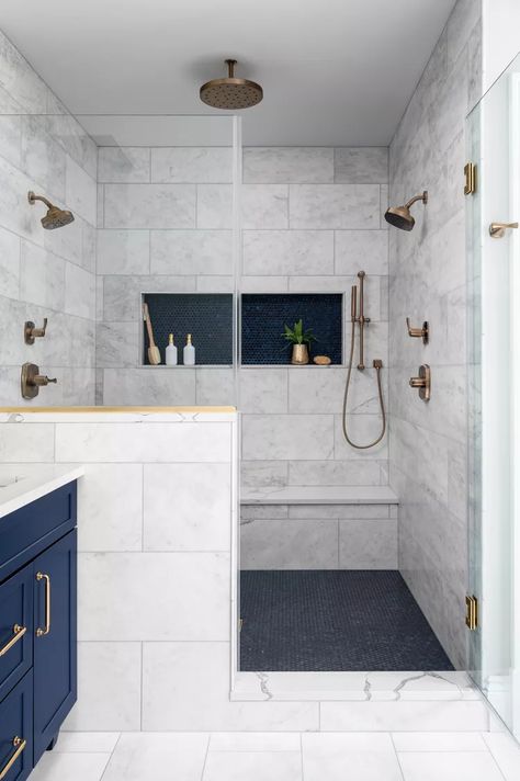 21 Walk-In Shower Ideas For Any Size Bathroom Tiny Bathroom Walk In Shower Ideas, Shower With Large Tiles, Master Shower Tile Ideas, Tiny Bathroom Remodel Ideas, Large Tile Shower Ideas, Shower Shelf Ideas, Bathroom Shower Tile Ideas, Large Tile Bathroom, Large Shower Tile