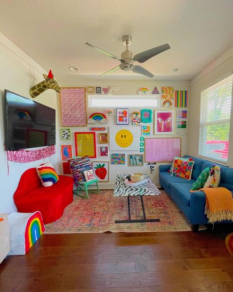 lots of colorful prints and canvas. Zebra Table. Lips couch. Lots of rainbows and smiley faces. Rainbow Gallery Wall, Lisa Frank Home Decor, Rainbow Maximalist Decor, Smiley Face Room, Trippy Living Room, Smiley Decor, Rainbow Living Room, Rainbow Office, Rainbow Furniture