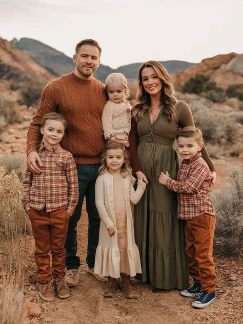 15 Fabulous Family Picture Outfit Ideas That'll Make Your Photos Pop 3 Navy Orange Family Pictures, Winter Outfits For Family Photos, Family Fall Pictures Poses, Family Photo Outside Fall, Fall Holiday Family Photos, Earthy Outfits Family Photos, Fall Picture Colors Outfit Ideas, Burnt Orange And Black Family Pictures, Family Photo Outfits Green And Brown