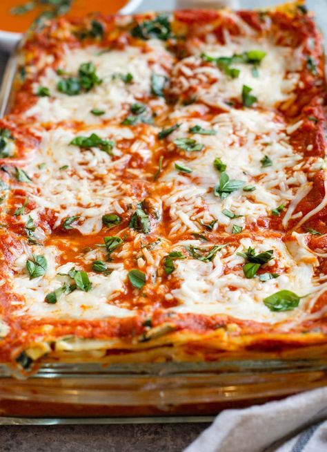 This vegetarian lasagna is filled with abundant spinach and cheese for everyone to enjoy. Easy to make recipe with make ahead of time tips. Best Vegetable Lasagna Recipe, Lasagna Recipe Spinach Ricotta, Vegetarian Recipes Lasagna, Veg Lasagna Recipe Easy, Vegetarian Spinach Lasagna, Meatless Lasagna Recipe, Vegetarian Lasagna Recipe With Ricotta, Spinach Ricotta Lasagna, Veggie Lasagna Recipe Easy