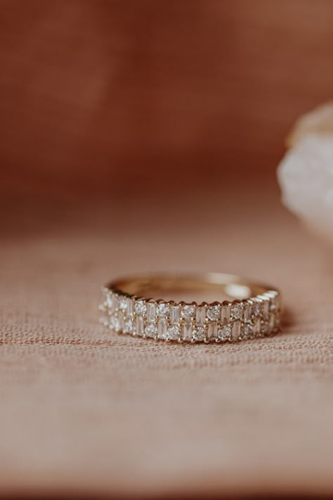 14k gold band with two rows of .53 cts of baguette and round diamonds, set in prongs in an alternating pattern. Available in rose, yellow, or white gold. Gold Baguette Ring, Baguette Diamond Ring, Ring Baguette, Baguette Diamond Rings, Baguette Ring, Round Diamond Ring, Dream Engagement Rings, To Infinity And Beyond, Unique Diamonds