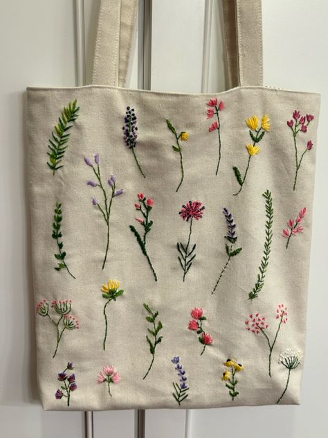 Floral embroidery, lined canvas tote with pockets and pleated bottom, wildflower pattern Tote With Pockets, Brilliant Quotes, Flower Stitch, Wildflower Pattern, Purse Collection, Embroidery Crafts, Tote Bag With Pockets, Simple Hand Embroidery Patterns, Herbs And Flowers