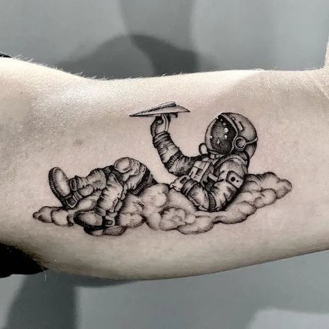 Astronaut Tattoo Ideas Spaced Out Tattoo Sleeve, Astronaut Arm Tattoo, Galaxy Chest Tattoo Men, Funny Astronaut Tattoo, As Above So Below Tattoo Astronaut, Realistic Astronaut Tattoo, Astronaut Sitting On Planet Tattoo, Spaceman Tattoo Design, Space Arm Tattoos For Women