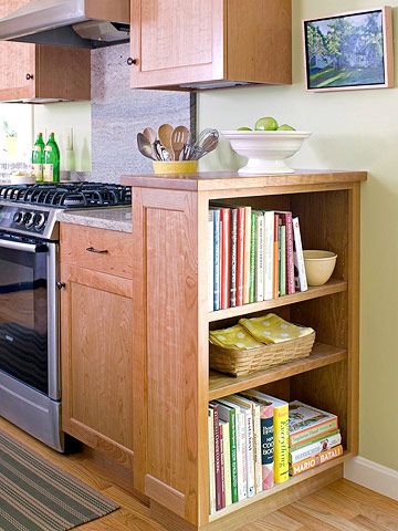 Open-Shelf Storage Solution - Boost storage and display space in a kitchen by capping off a run of cabinets with open shelves. These shelves face the adjoining breakfast room and offer a convenient spot for storing cookbooks. The shelf unit also rises slightly above the counter surface to help hide clutter. Storing Cookbooks, House Schemes, Kitchen Bookcase, Kitchen Bookshelf, Cookbook Storage, Hide Clutter, Corner Kitchen Cabinet, Kitchen Corner, Cabinet Makeover