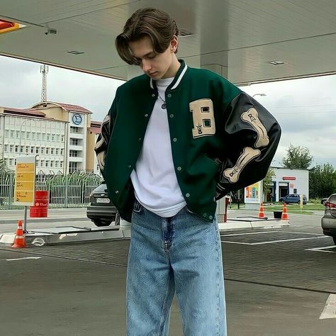 Mens Outfits Varsity Jacket, Varsity Jacket Poses Men, Men’s Varsity Jacket Outfit, Jacket And Shorts Outfit Men, Varsity Jacket Poses, Varsity Jacket Aesthetic Boy, Varsity Outfit Men, Men Varsity Jacket Outfit, Green Varsity Jacket Outfit